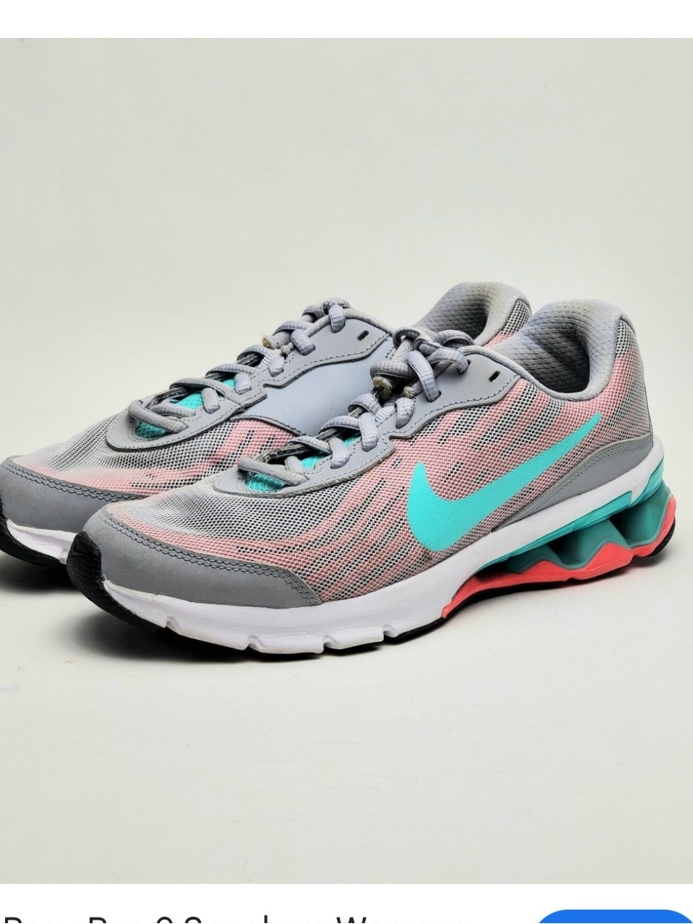 Nike Women's Light Gray Running Shoes with Teal and Coral Accents
